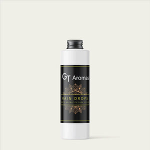 Botella de aceite aromático para difusor GT Aromas Rain Drops sobre fondo claro